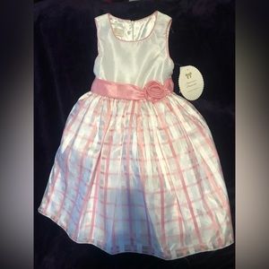 Beautiful pink and white dress with pink satin single rose belt